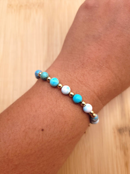 Pulsera- Denario Azul con tonos blancos y dorados